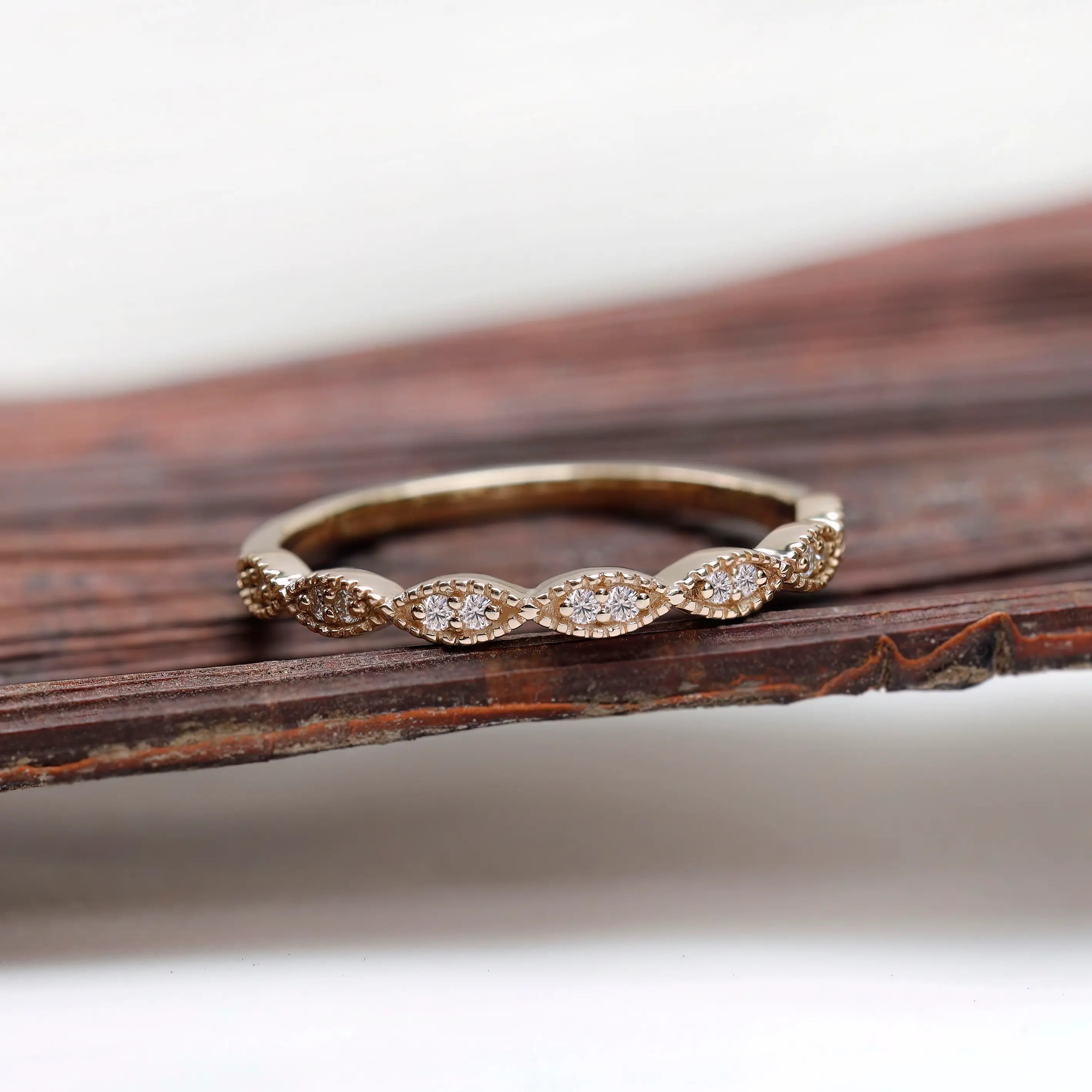 Front view geometric marquise milgrain moissanite wedding band