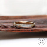 Front view of double row pave half eternity band