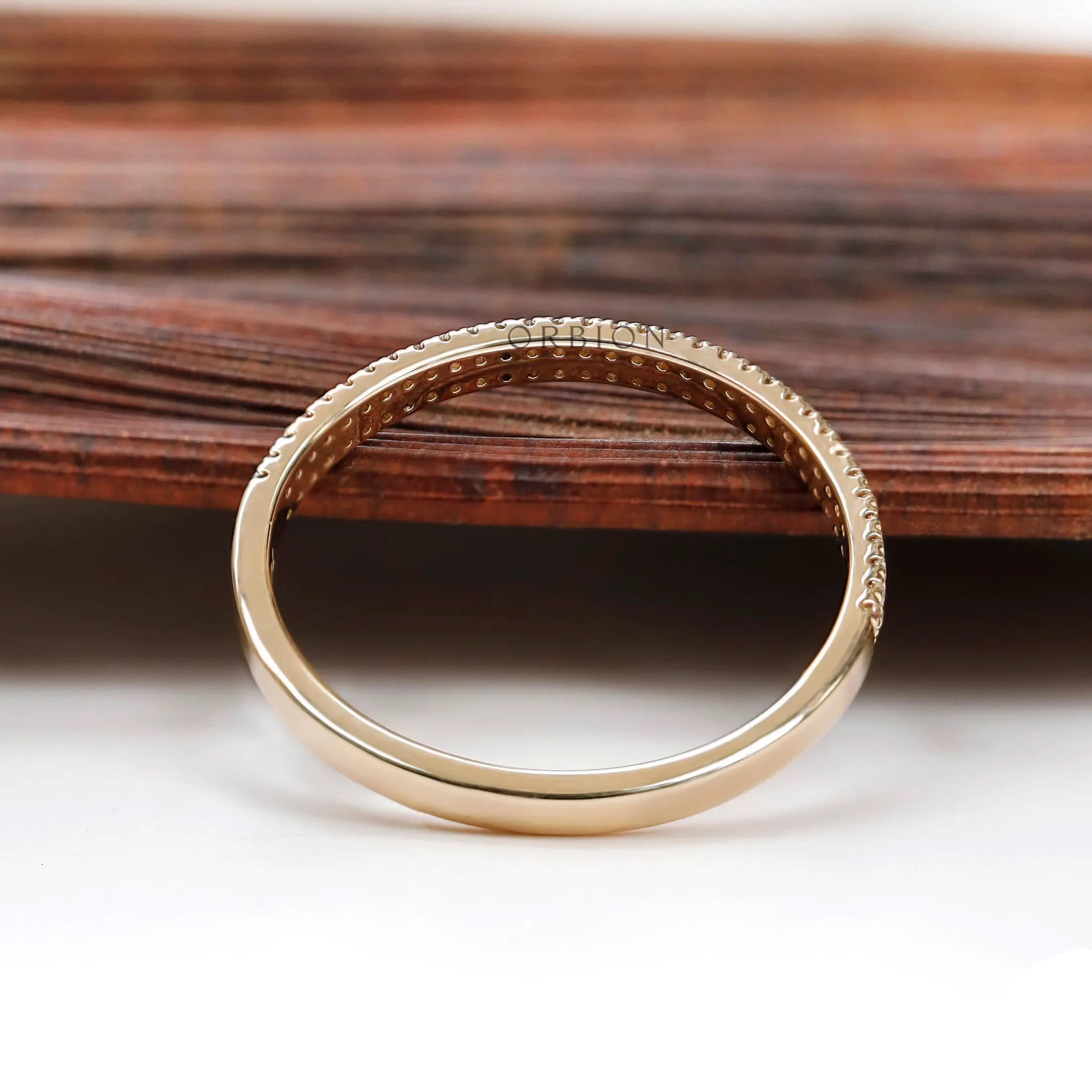 Low angle view emphasizing pave depth and finish