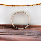 Side profile highlighting half eternity pave setting