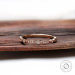 Front view geometric moissanite halfway wedding band