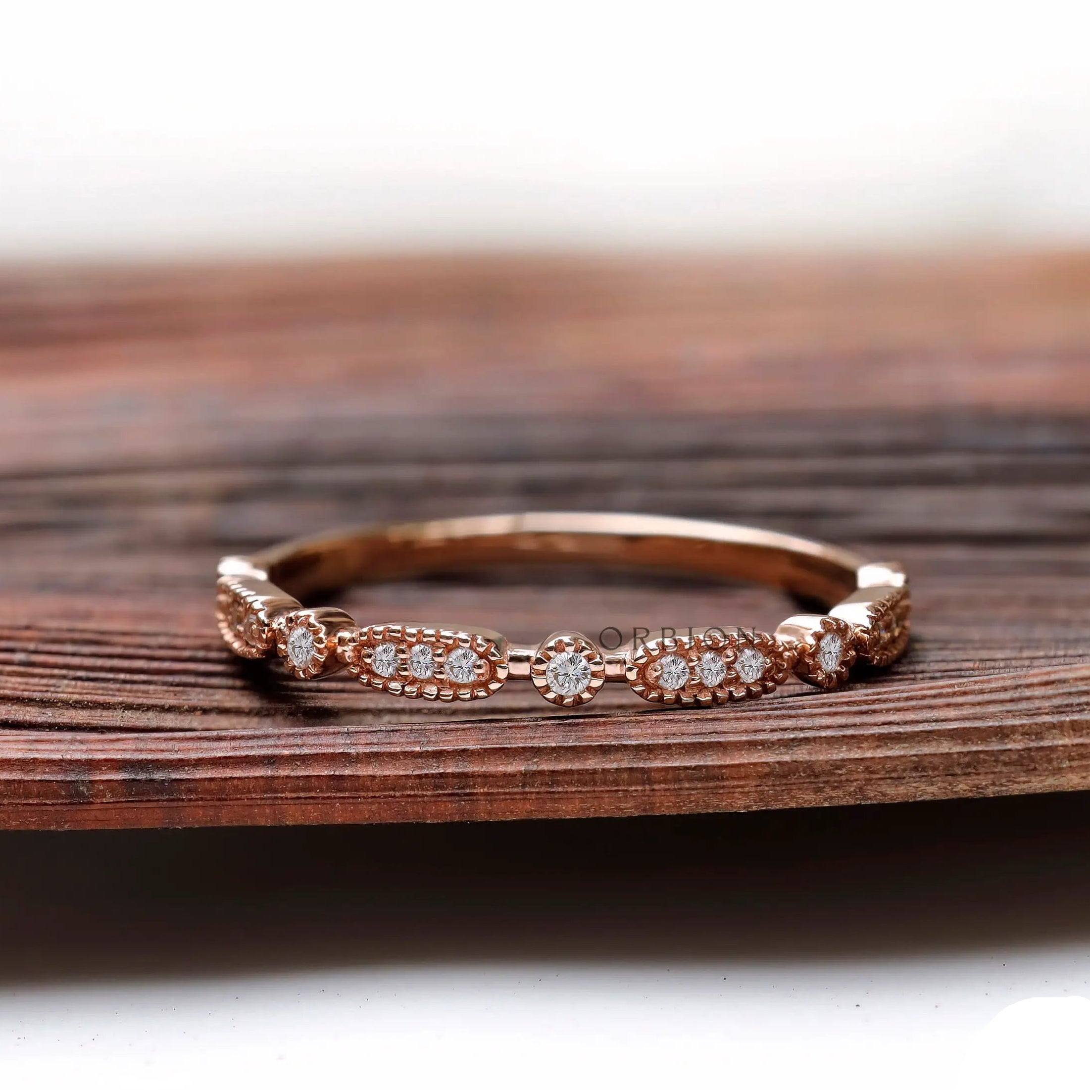 Front view geometric moissanite halfway wedding band