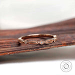 Angled view geometric textured band with round stone accents