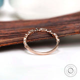 Interior and setting detail of geometric textured wedding band