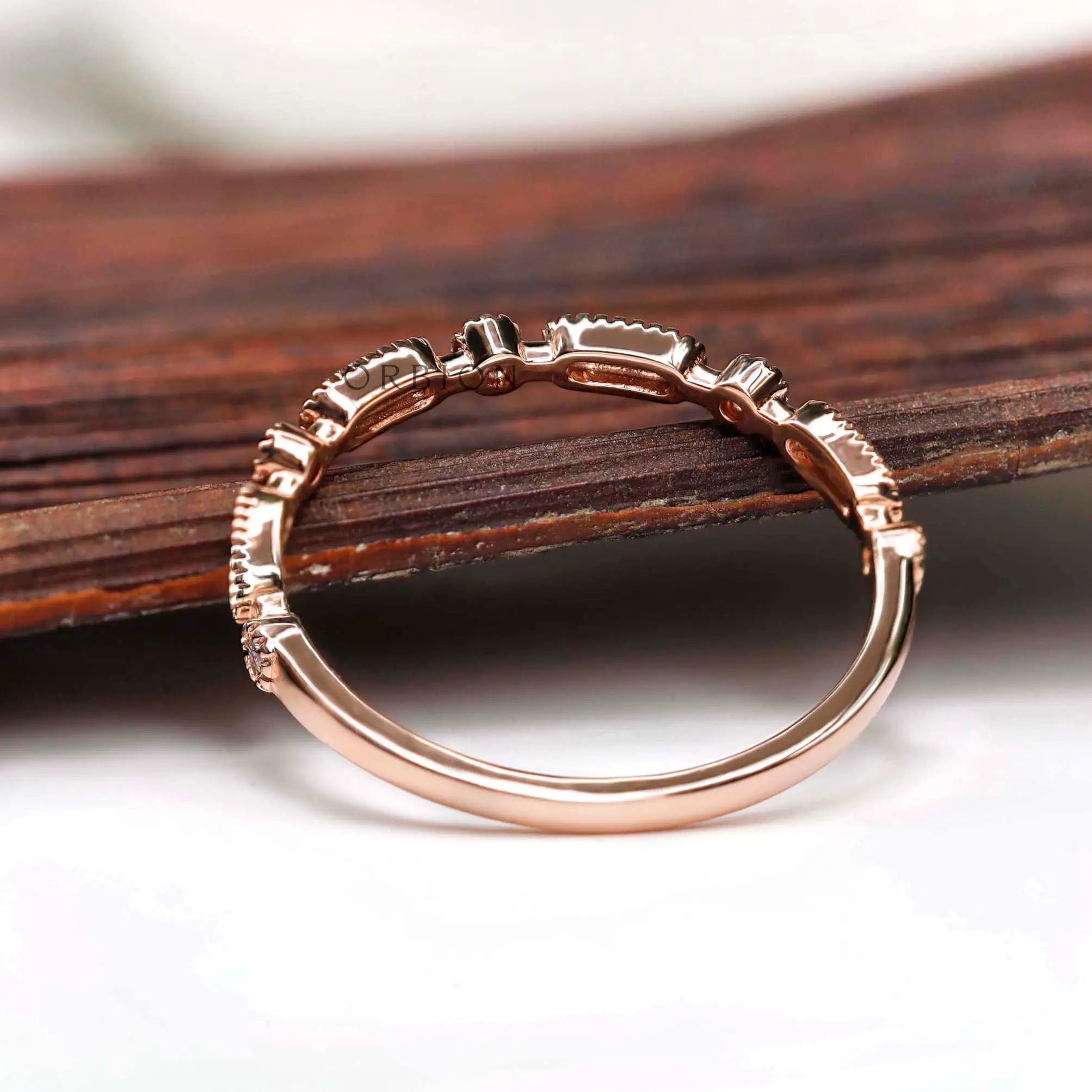 Interior and setting detail of geometric textured wedding band