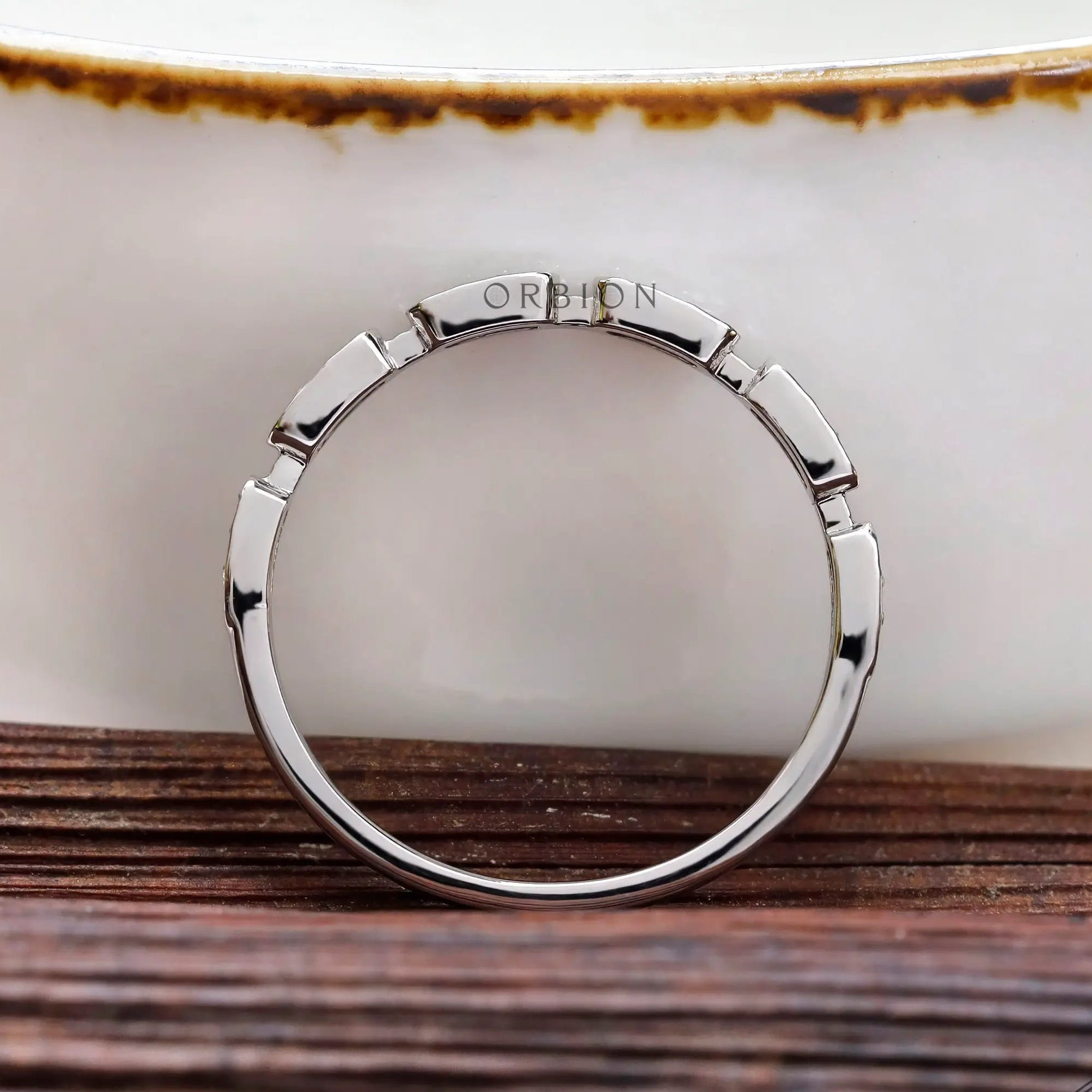 Rear view of polished white gold band