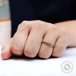 Macro view of brilliant cut moissanite accents