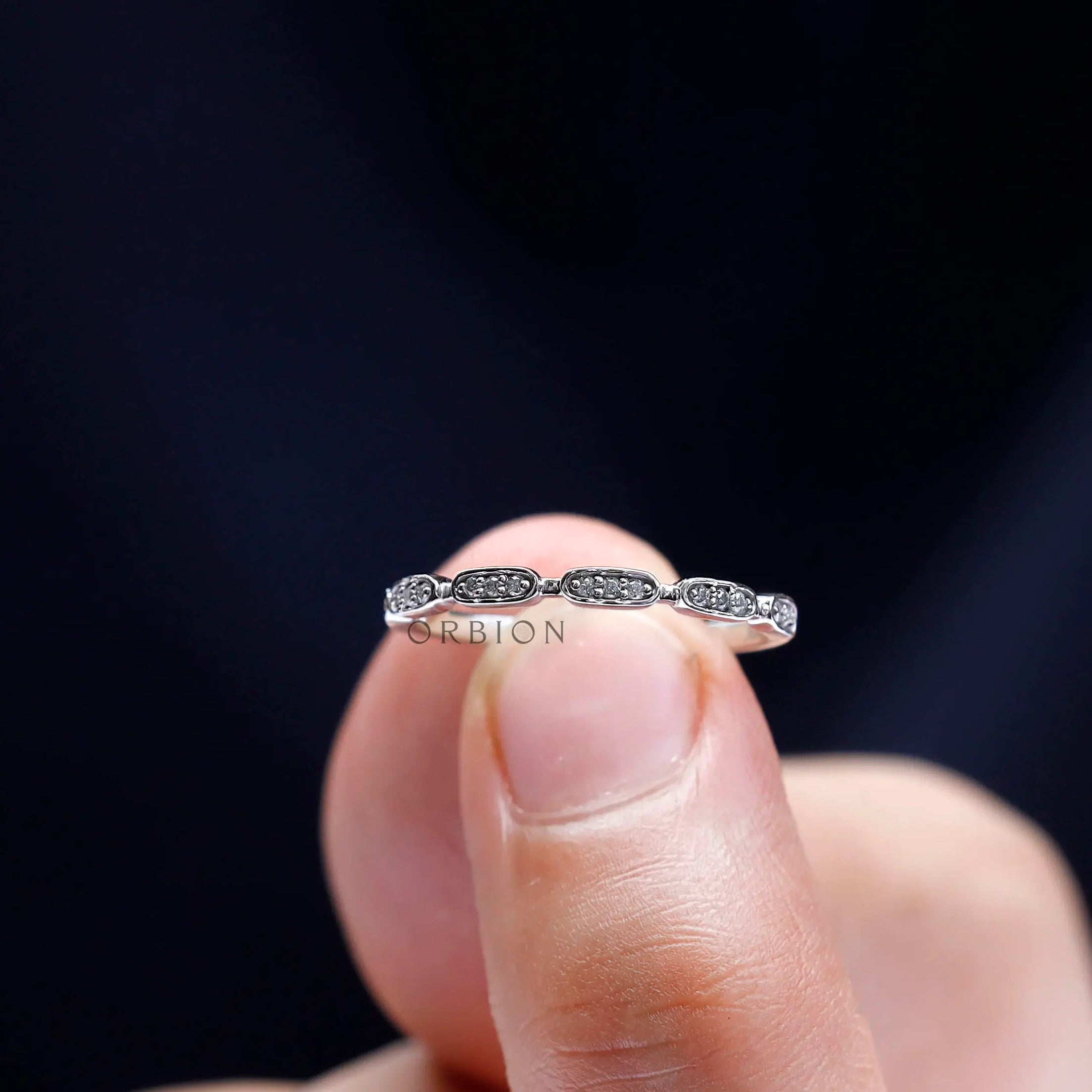 Lifestyle view of minimalist geometric moissanite band