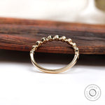 Angled View Highlighting Bubble Moissanite Eternity Design