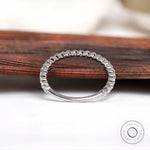 Floating bubble moissanite eternity band showing full circle prong setting