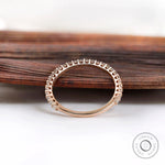 Back view of U-prong eternity band showing full circle setting detail