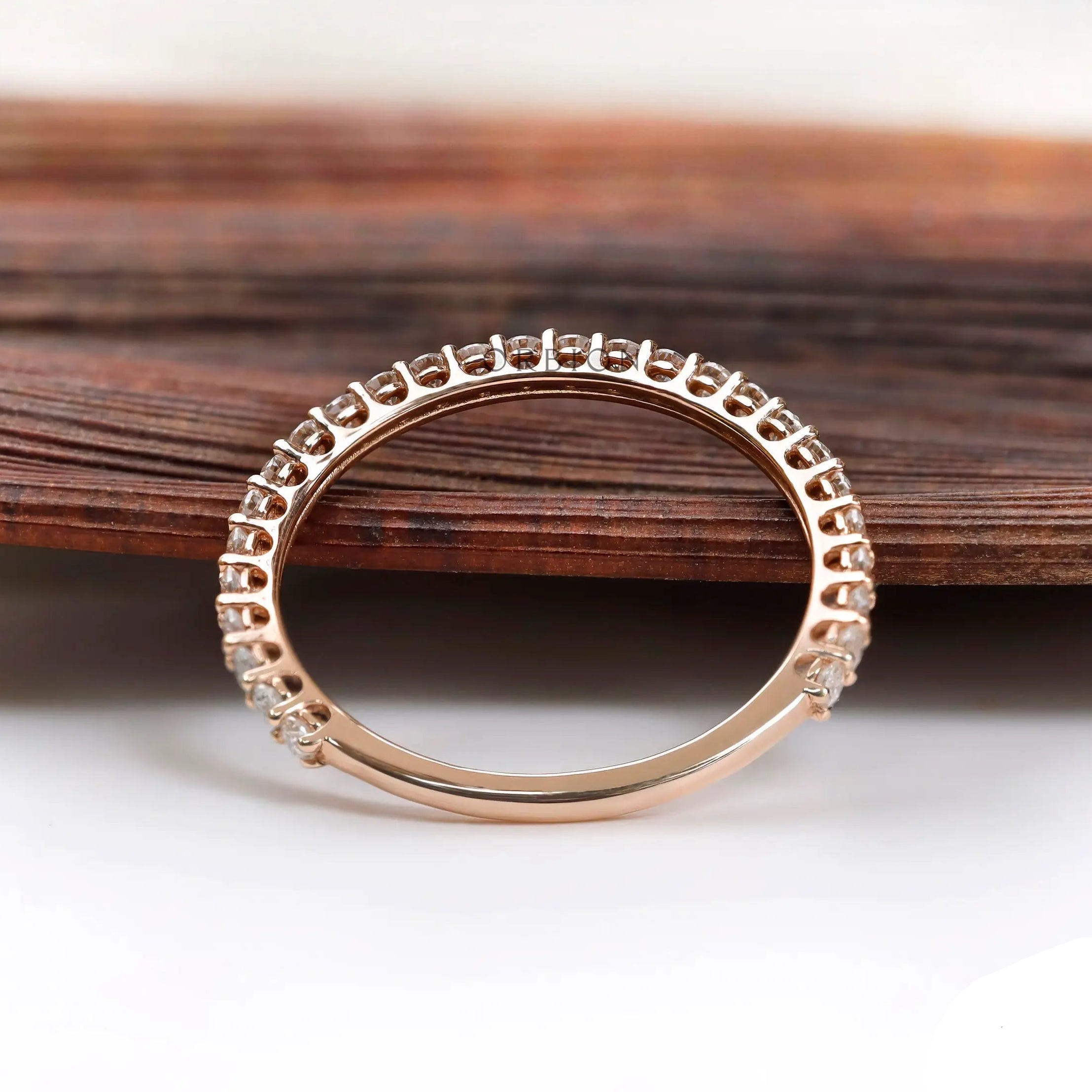 Back view of U-prong eternity band showing full circle setting detail