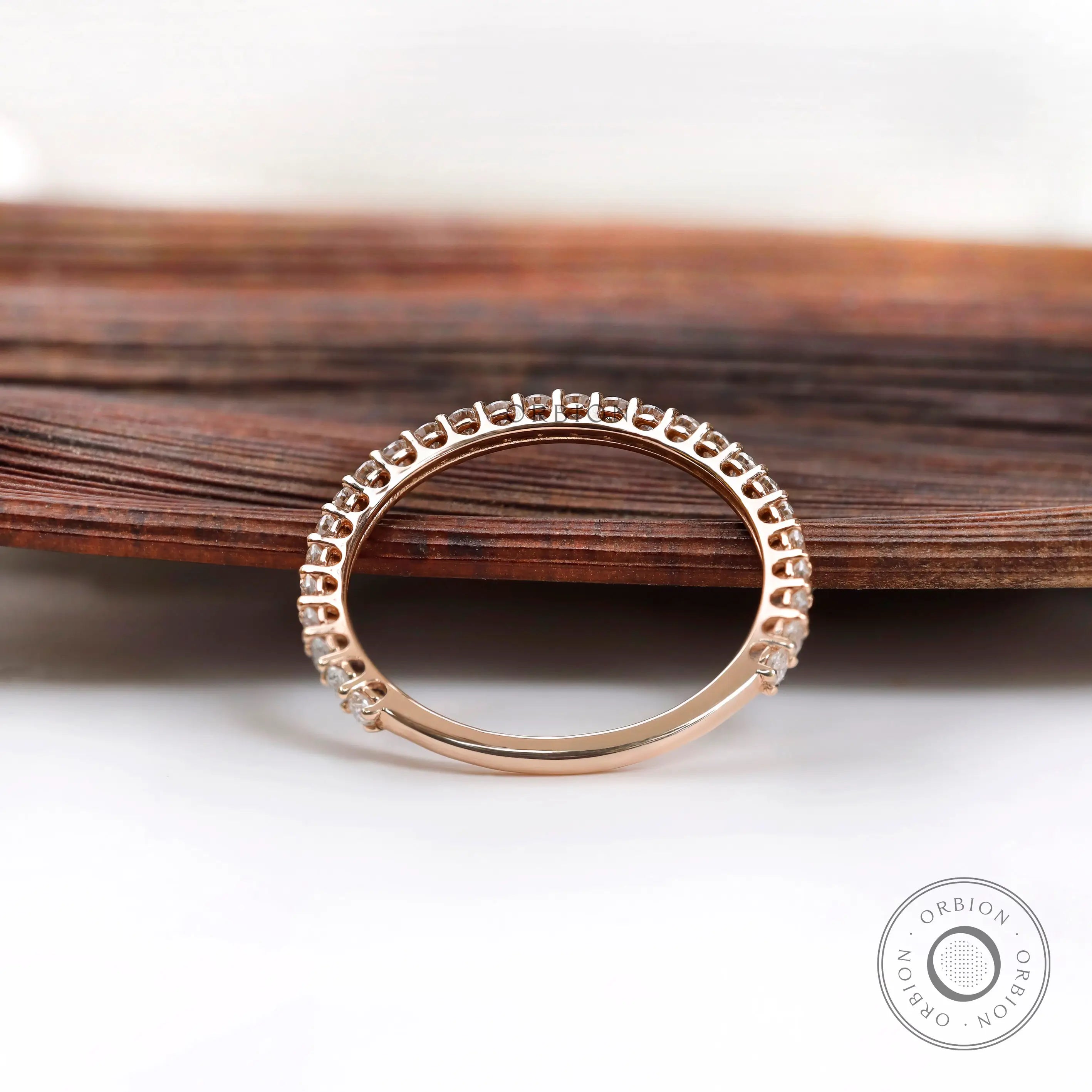 Back view of U-prong eternity band showing full circle setting detail