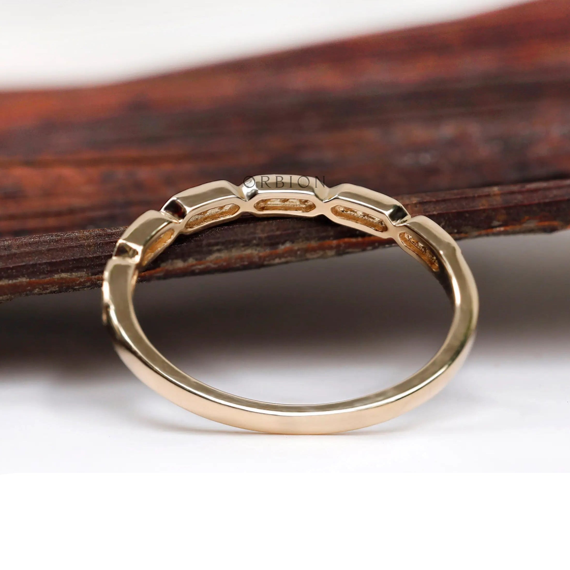 Underside and interior view of geometric hexagon diamond band
