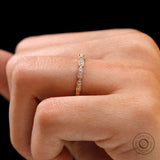 Close-up of hexagon shaped diamond details on dainty stacking band