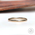 Simple thin plain yellow gold band front view