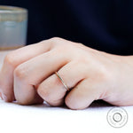 Classic thin plain gold band edge view
