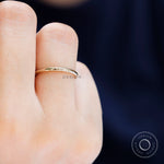 Minimal thin plain yellow gold ring lifestyle view