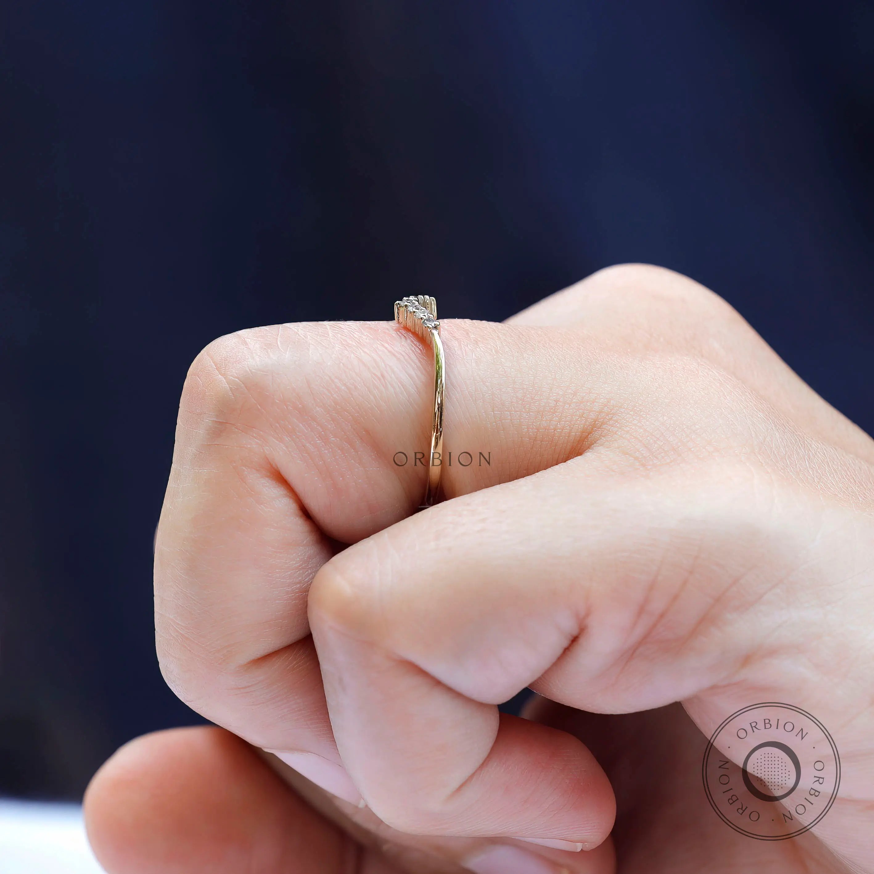 Stackable thin chevron band in yellow gold