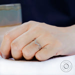 Chevron moissanite band worn on hand minimal stacking look