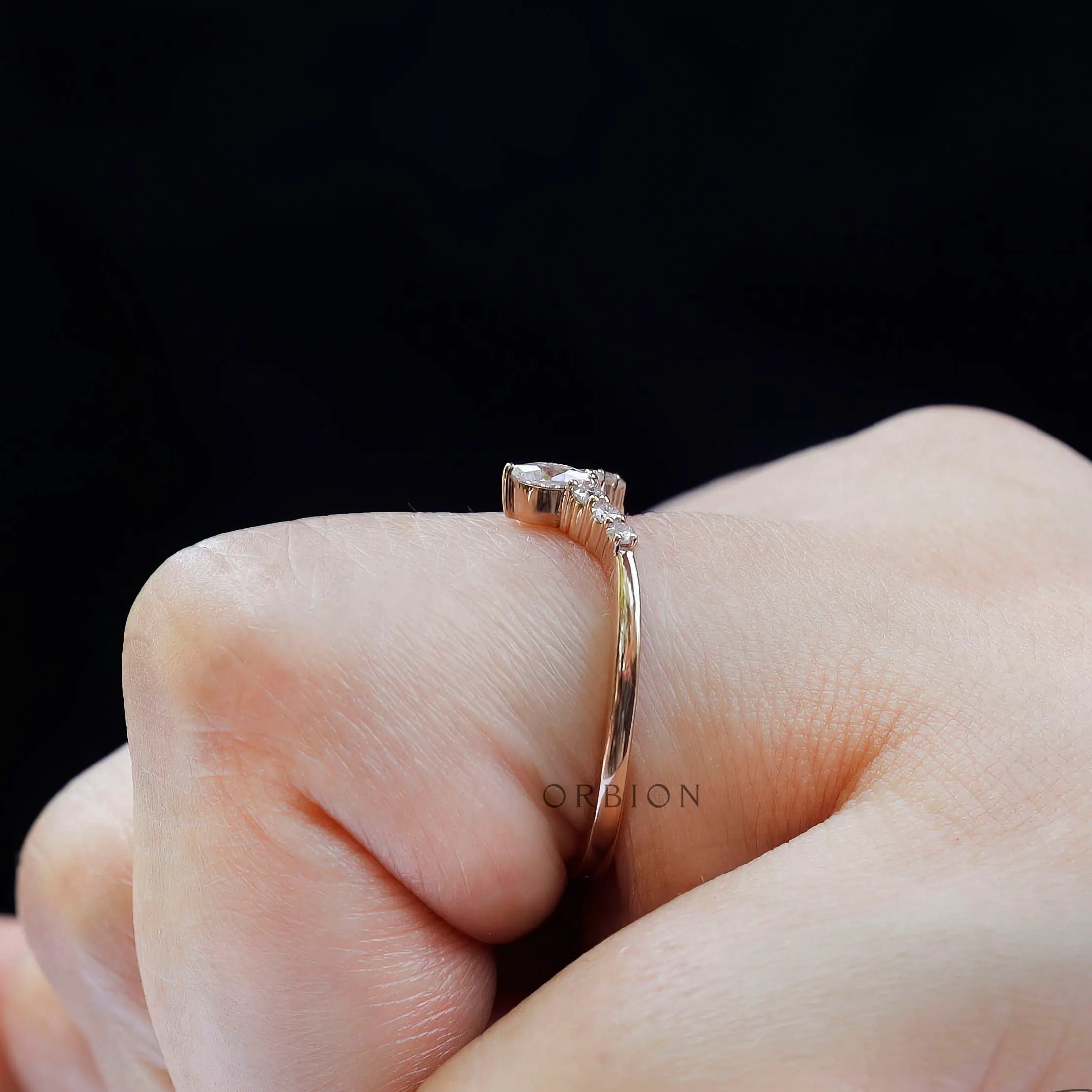 Side angle view showing smooth polished band and stone setting height