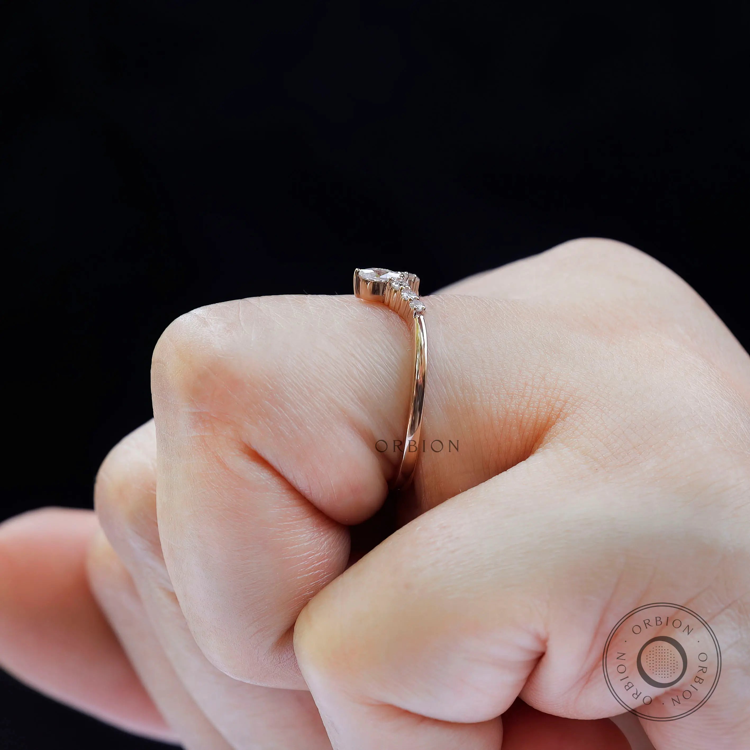 Side angle view showing smooth polished band and stone setting height
