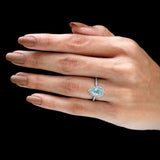 Elegant Light Green Moissanite Halo Ring in White Gold - Perfect for Proposals Unique and Sparkling Pear Cut Design, A Timeless Choice