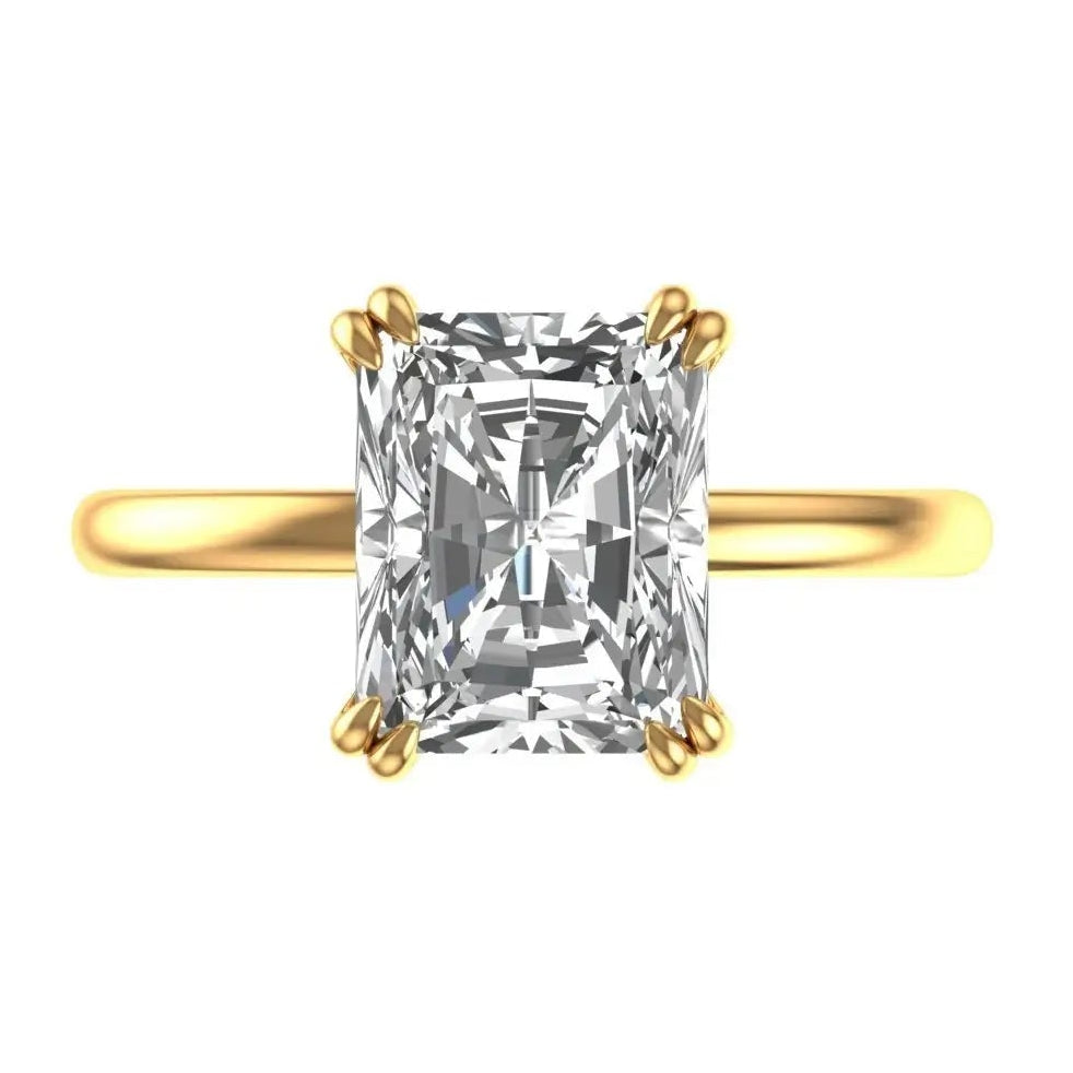 Radiant cut solitaire engagement ring in 14K yellow gold