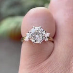 Rotating video of round cut lab grown diamond cluster ring in 18K dual tone gold