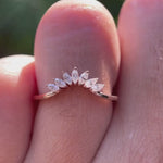 Close up rotating view of Curved nesting band worn on hand