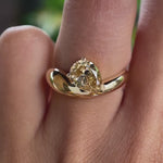 Chunky pear moissanite ring showcasing bold yellow gold design