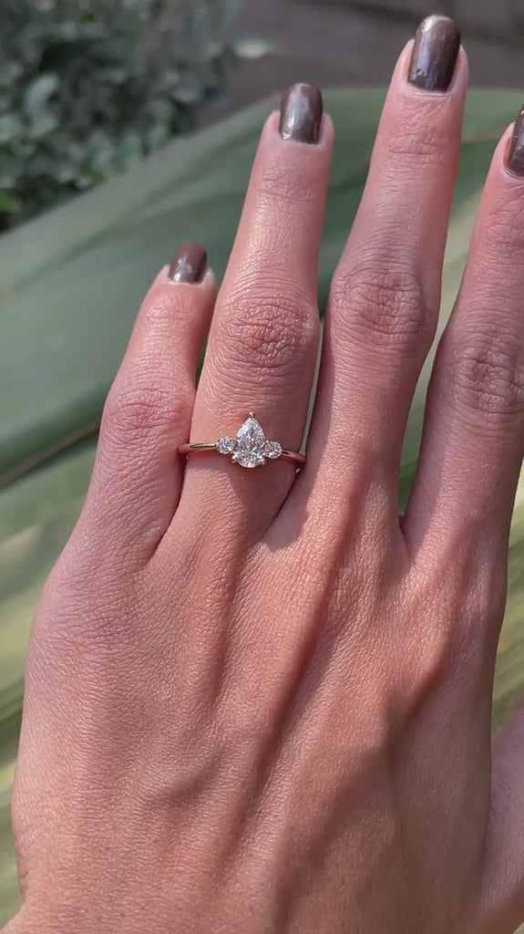 Delicate three stone pear lab diamond ring worn on hand video