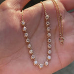 Old european cut round diamond necklace close up antique sparkle