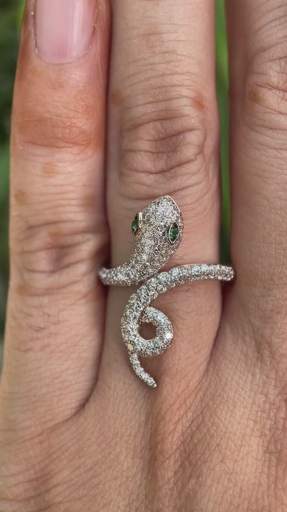 Diamond snake ring worn on hand showing sculpted snake head video