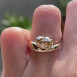 Elongated oval old mine cut champagne moissanite solitaire ring on hand video