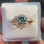 Rotating view of nature inspired ring set on soft white box
