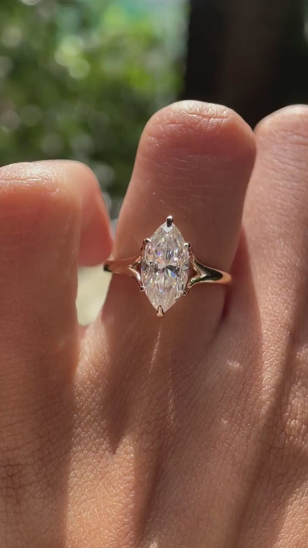 Elegant marquise with split shank ring shown in rotating view