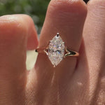 Elegant marquise with split shank ring shown in rotating view