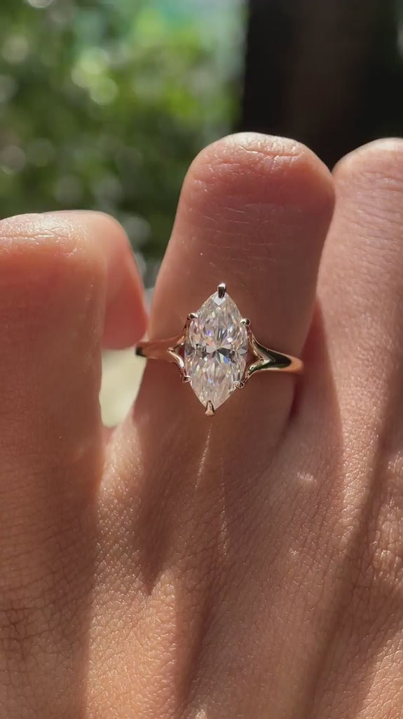 Elegant marquise with split shank ring shown in rotating view