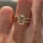Elongated cushion champagne moissanite double shank ring rotating view