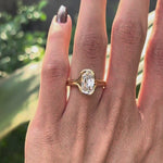 Close rotating view elongated cushion split shank diamond ring worn on hand
