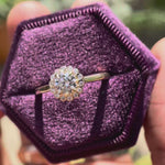 Video showcasing round lab grown diamond cathedral halo ring in 14K yellow gold