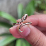 Product video showcasing the diamond snake ring in 14K rose gold from multiple angles.