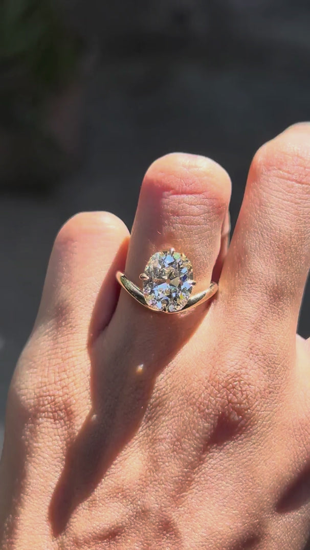 Bypass solitaire diamond ring compass setting yellow gold