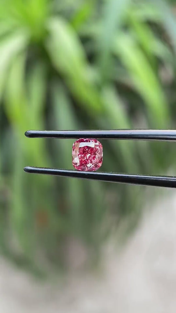 Rotating view of fancy deep purplish pink cushion lab diamond