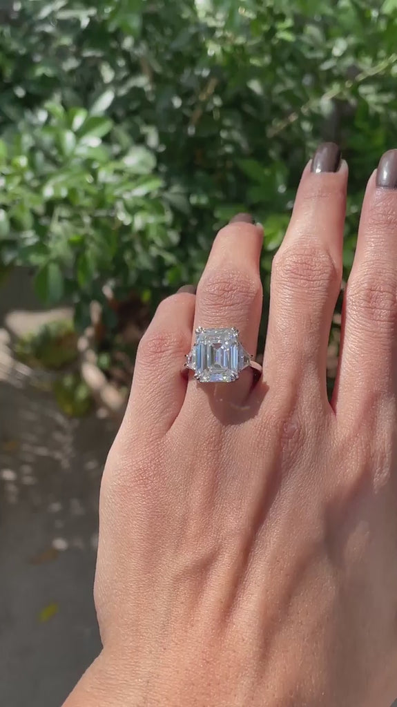 Emerald cut moissanite three stone engagement ring on hand video