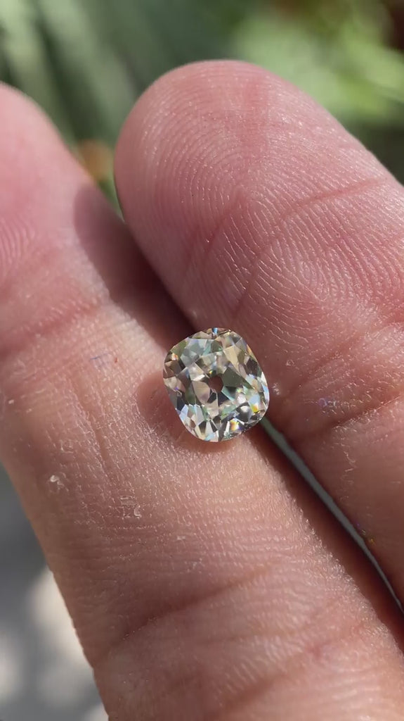 Elongated cushion old mine cut off white moissanite video
