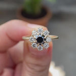 Round Old European Cut black moissanite halo ring in 10K yellow gold rotating view