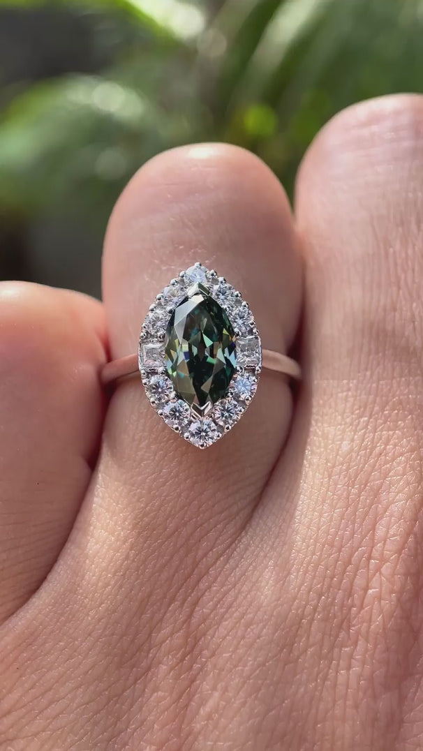 Marquise cut blue green moissanite halo ring video
