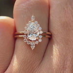 Pear lab grown diamond cluster engagement ring set in 14K rose gold shown from multiple angles